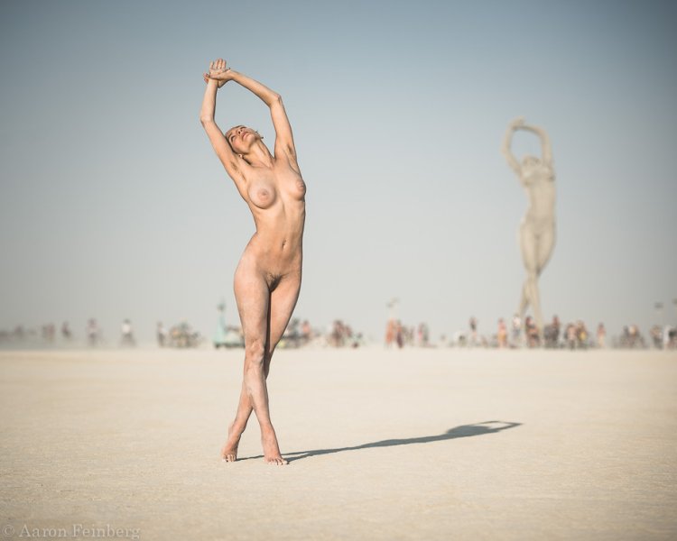 Woman's nudity in the desert