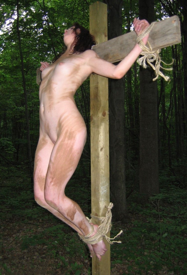 BDSM blonde crucifixion