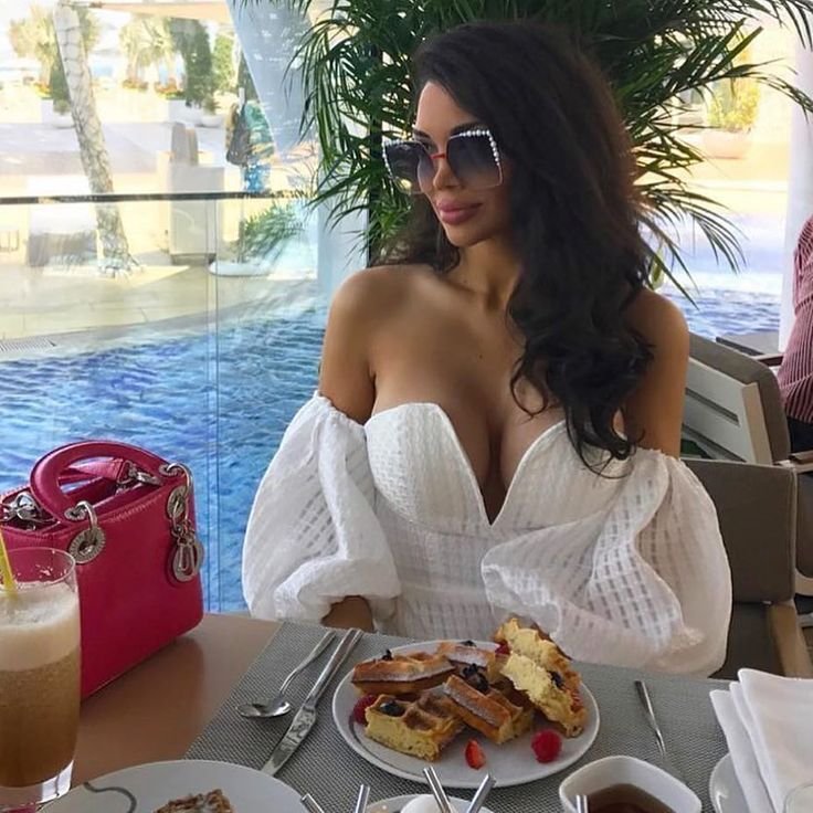 Gorgeous brunette in a restaurant