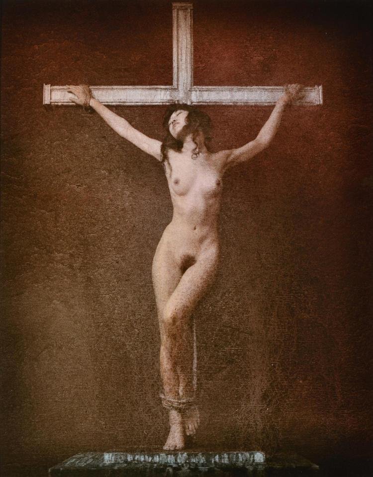 The girl is crucified naked