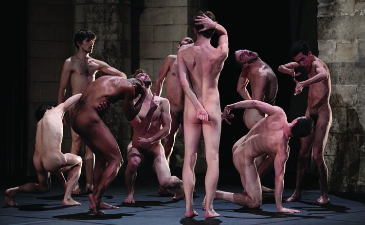 Naked guys on the stage of the theater