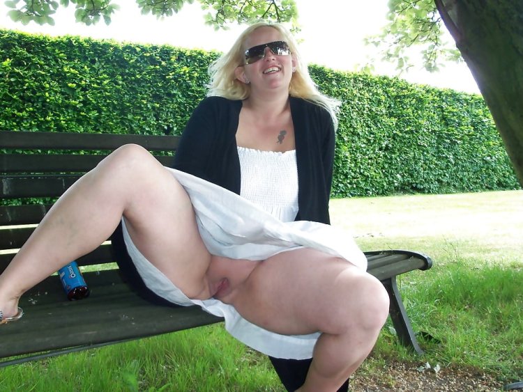 Old woman in stockings without panties
