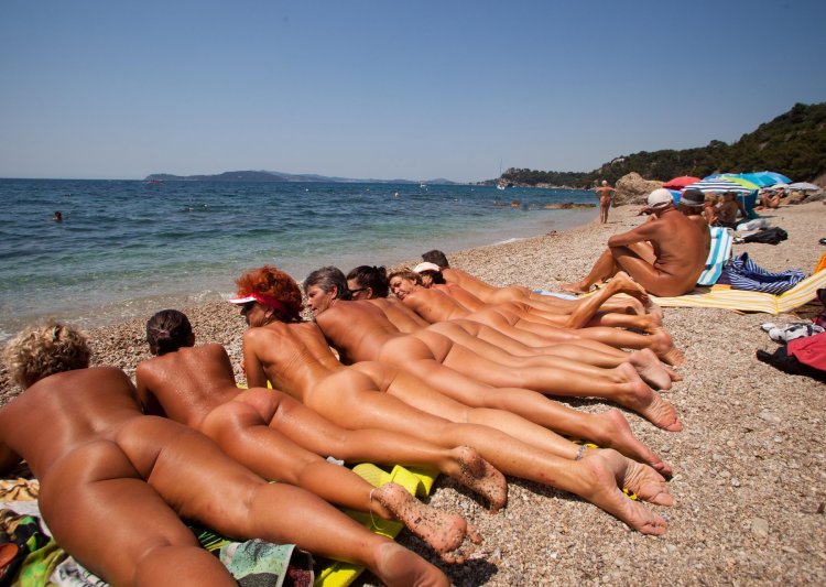 Naked friends of friends on the beach