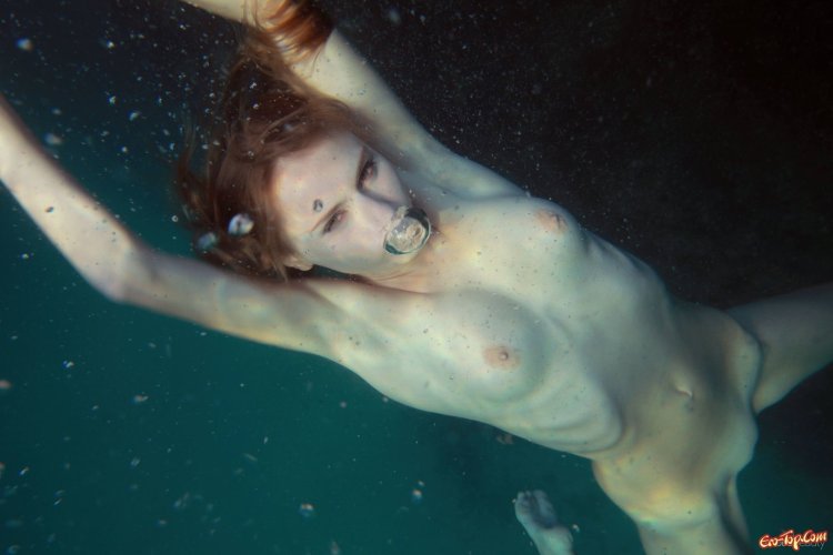 Naked mermaids in the water of real life