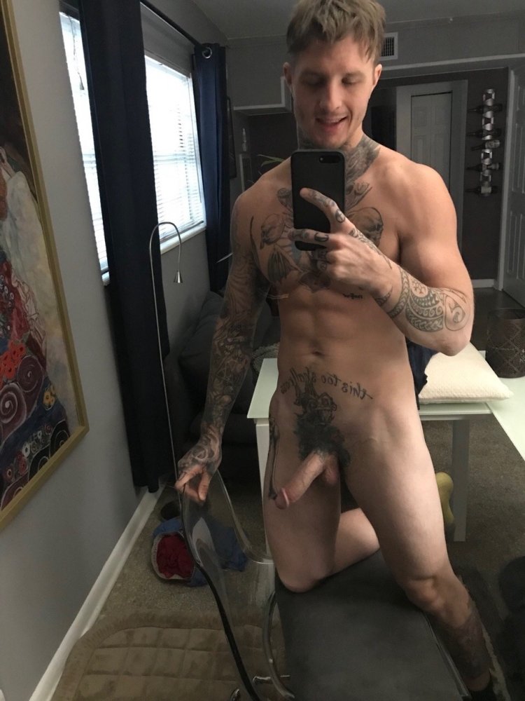 A man shows a Home Selfie point