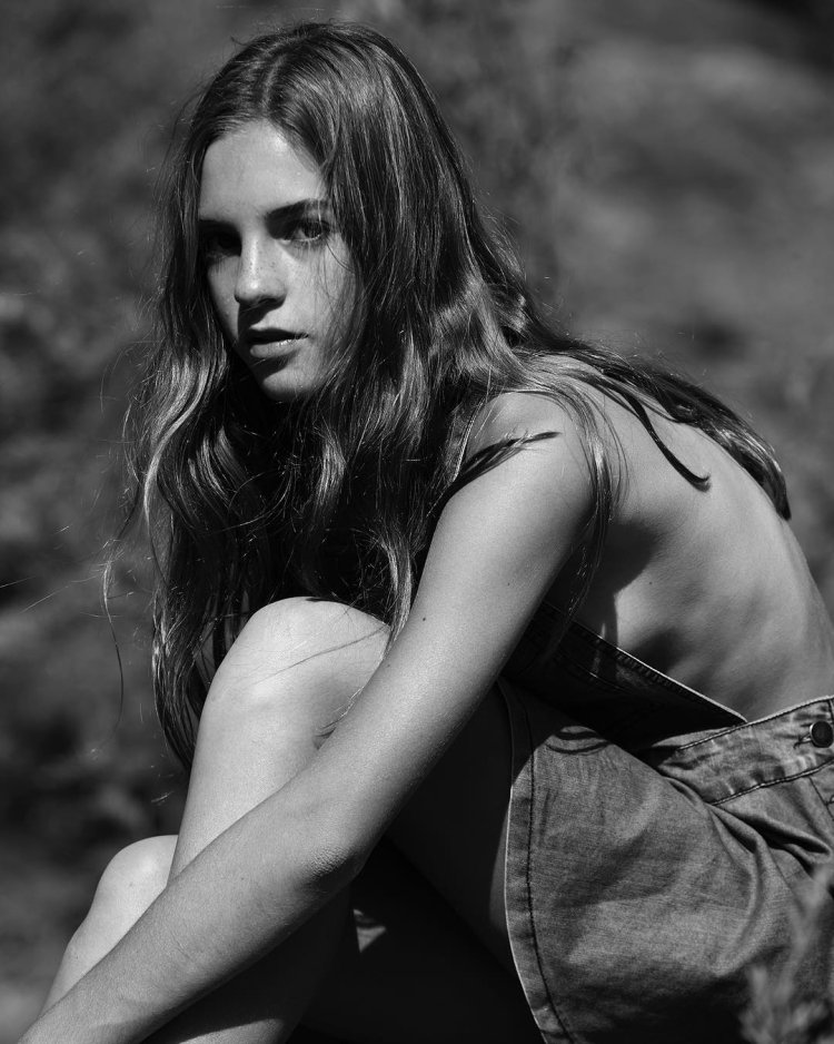 Emily Feld in shorts