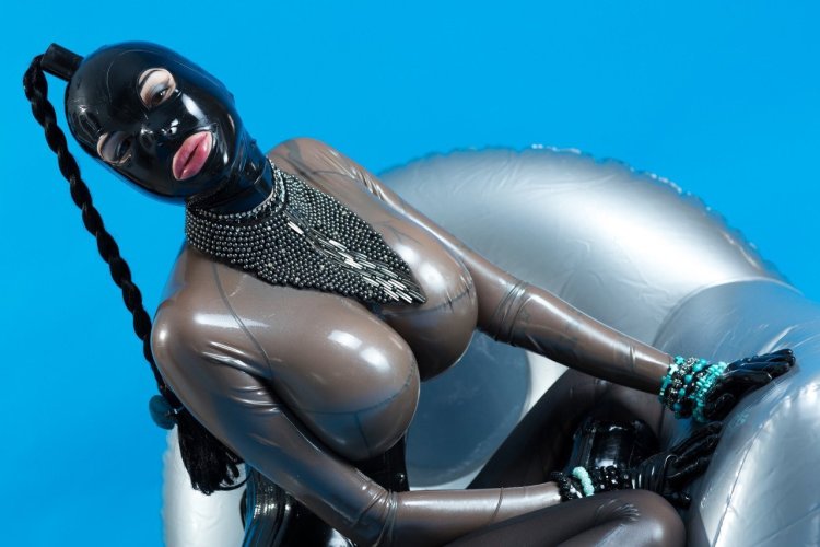 With big tits in latex