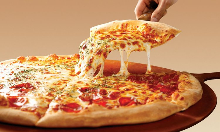 Pizza with pieces of mozzarella