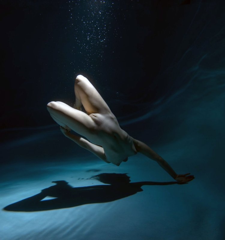 Artistic nude in water