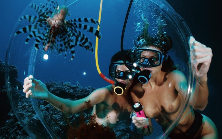 Naked with scuba dummy underwater
