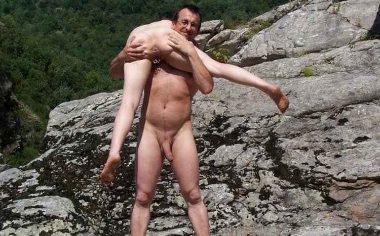 Naked man and woman in the mountains