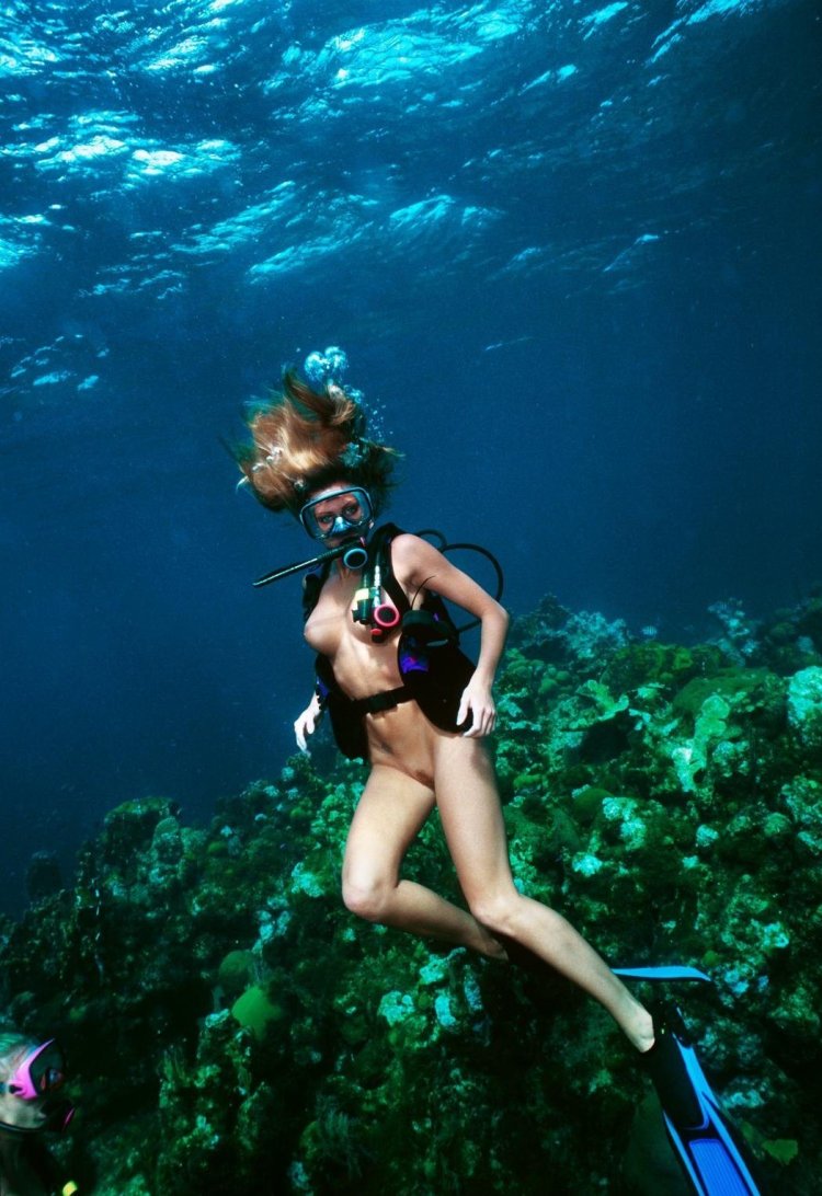 Underwater swimming girl