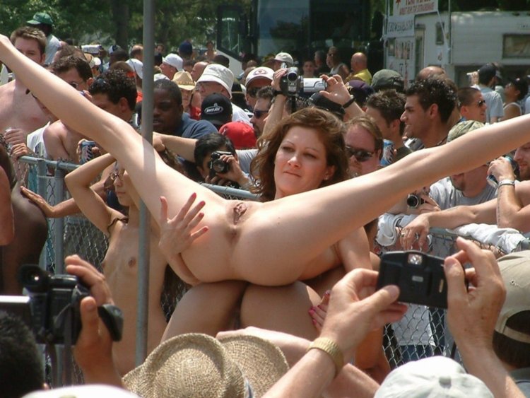 Naked women in front of people