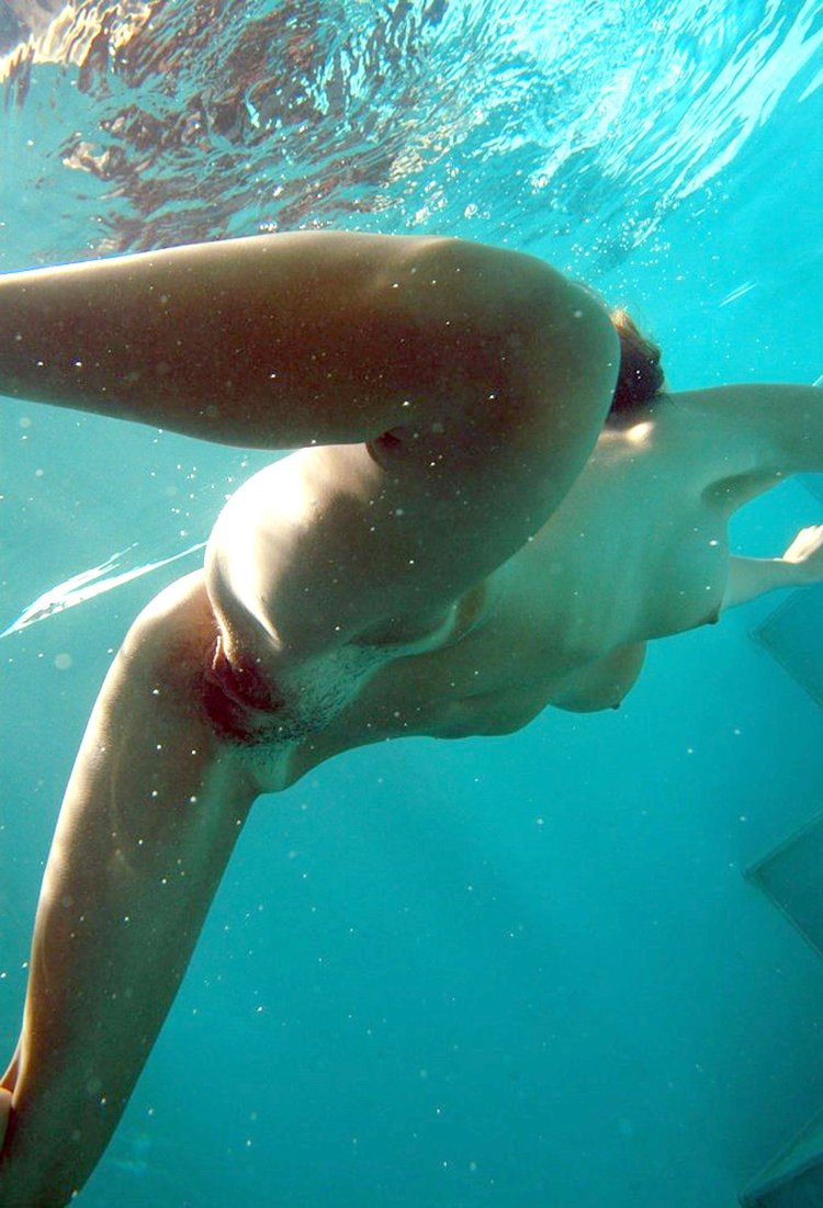 Naked women in the sea float