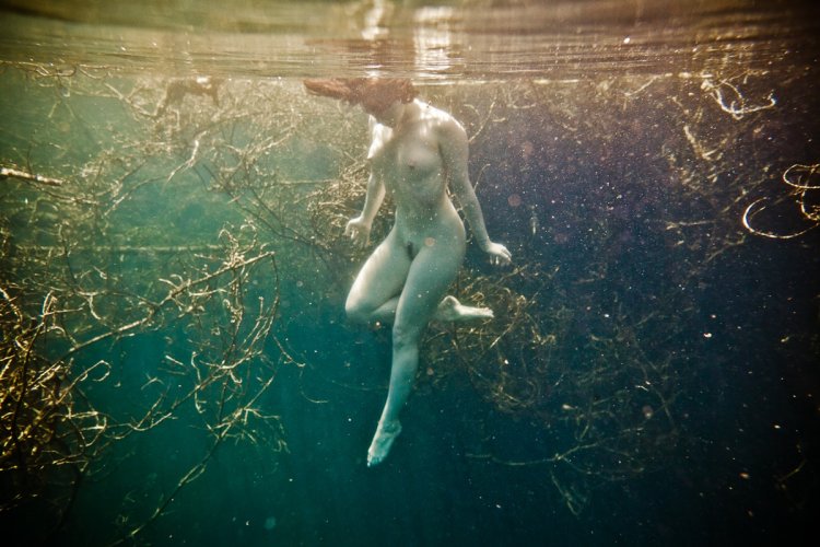 Naked swimming in the pool