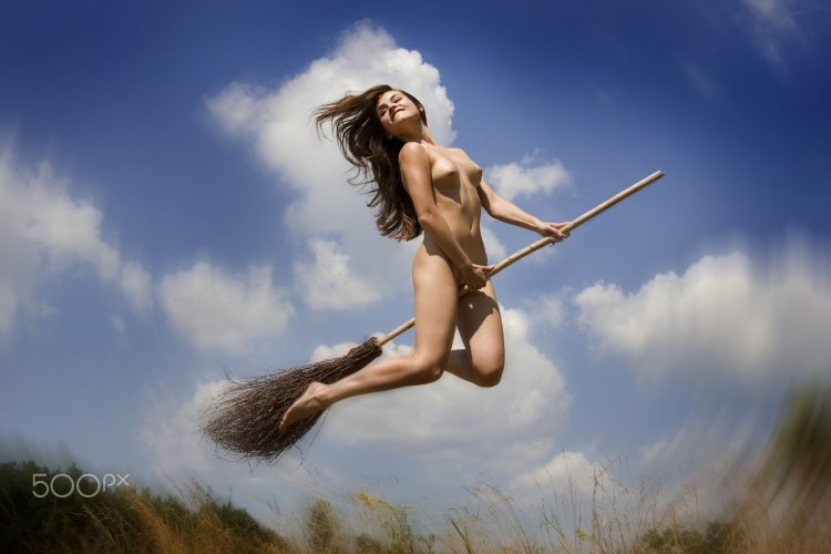 Shione Cooper naked on a trampoline