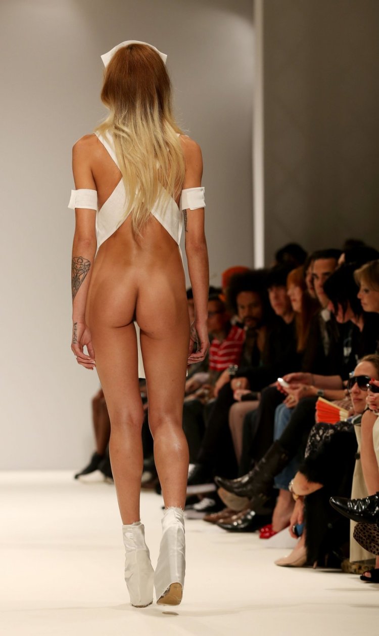 Models on the catwalk with bare tits