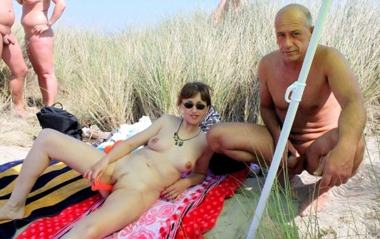Mature nudists in the pool