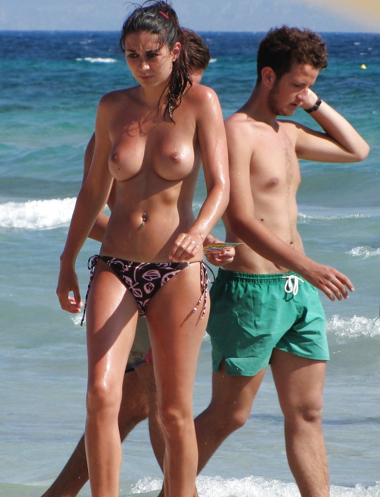 Girls with men Toples on the beach